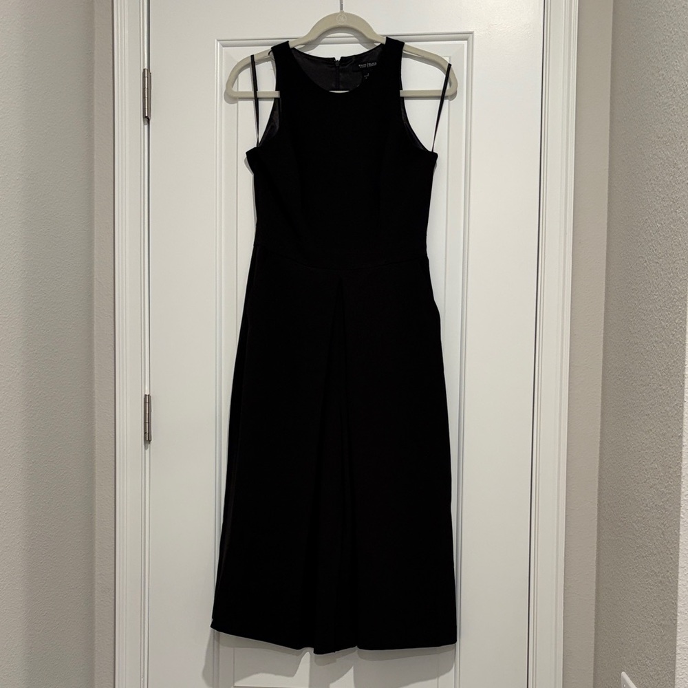 White House Black Market women’s Black Sleeveless Romper size 2 with pockets